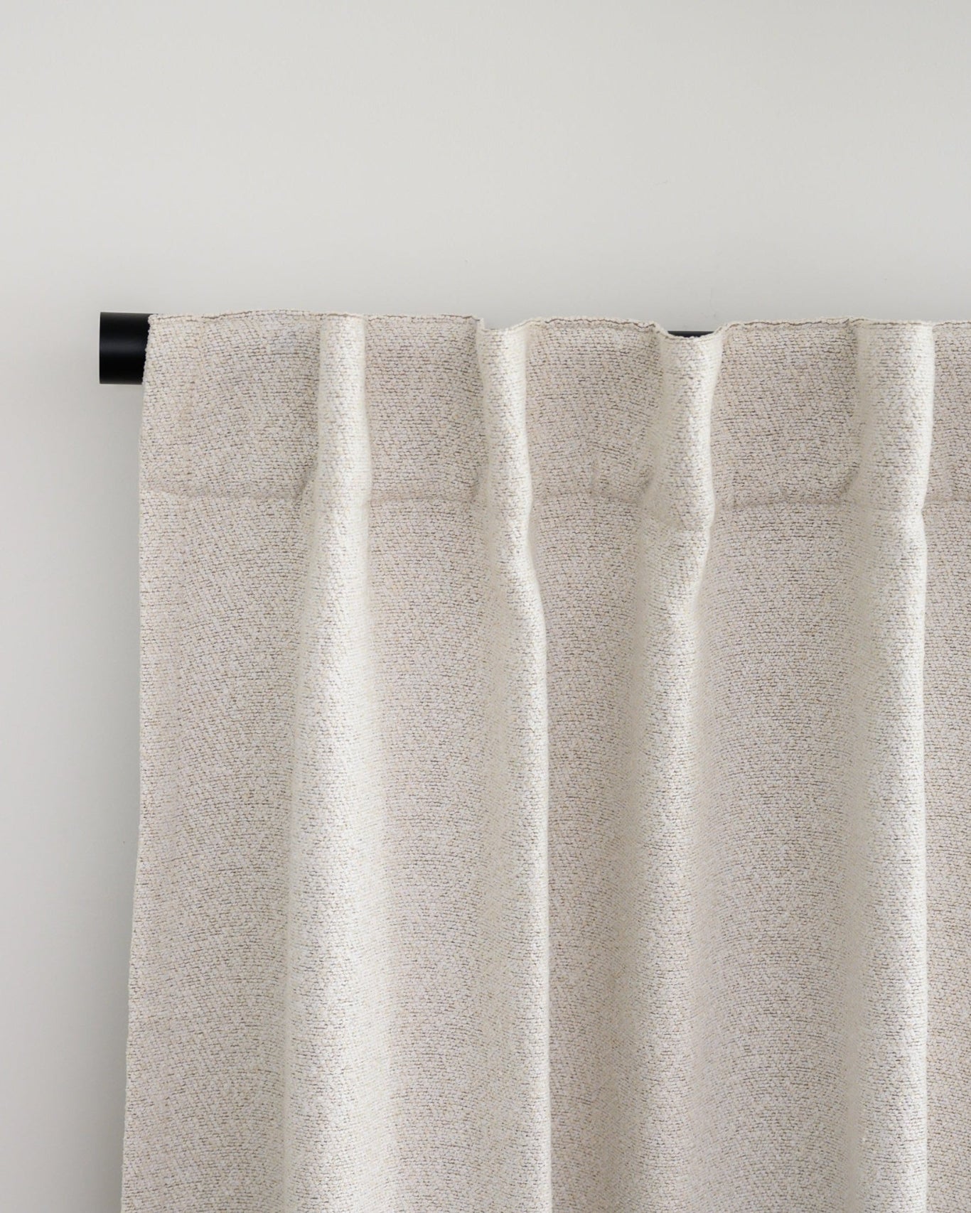 Brooklyn Boucle curtain with back tab header, styled in a relaxed pleat for a soft, designer finish.