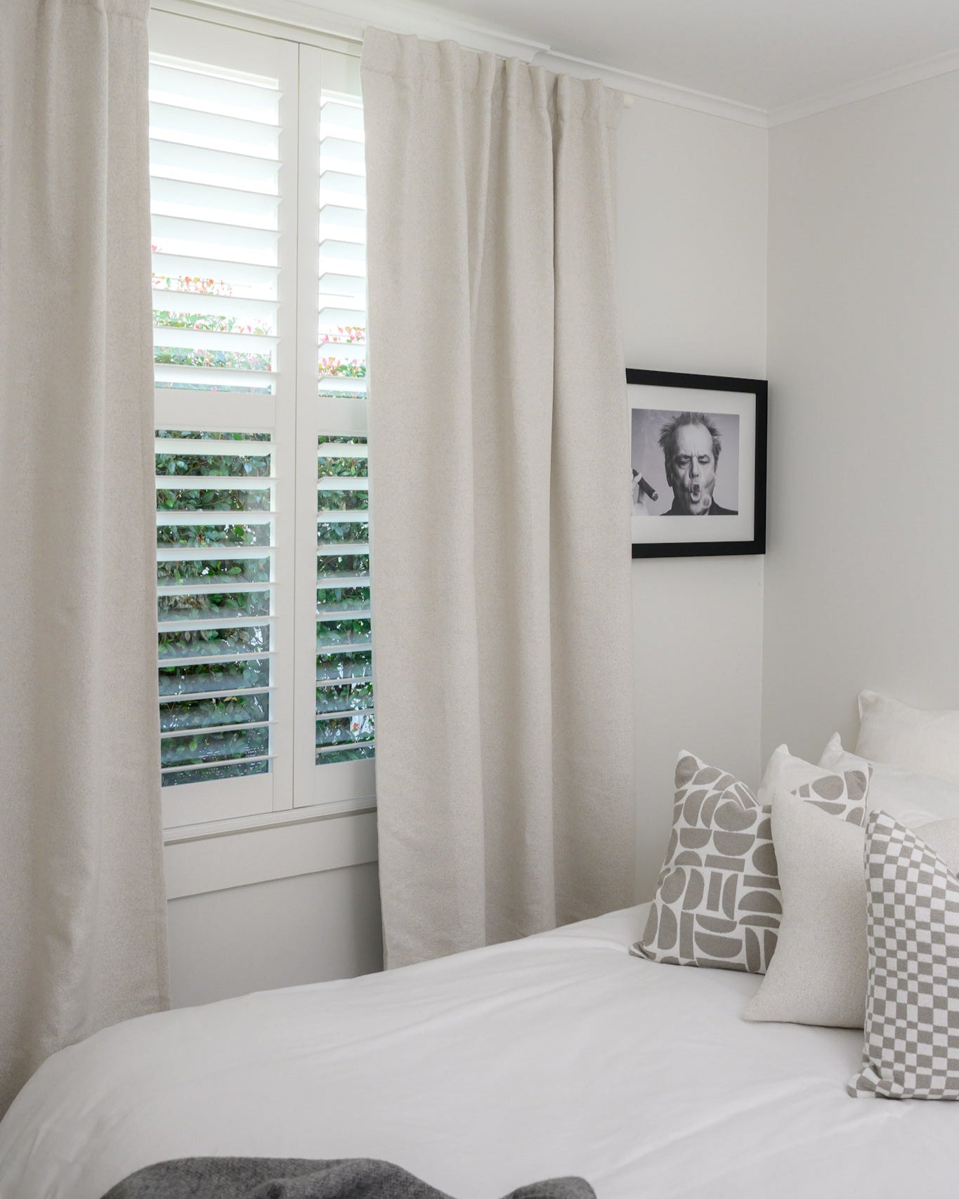 Brooklyn boucle curtain in bedroom, room-darkening fabric for warmth and style.