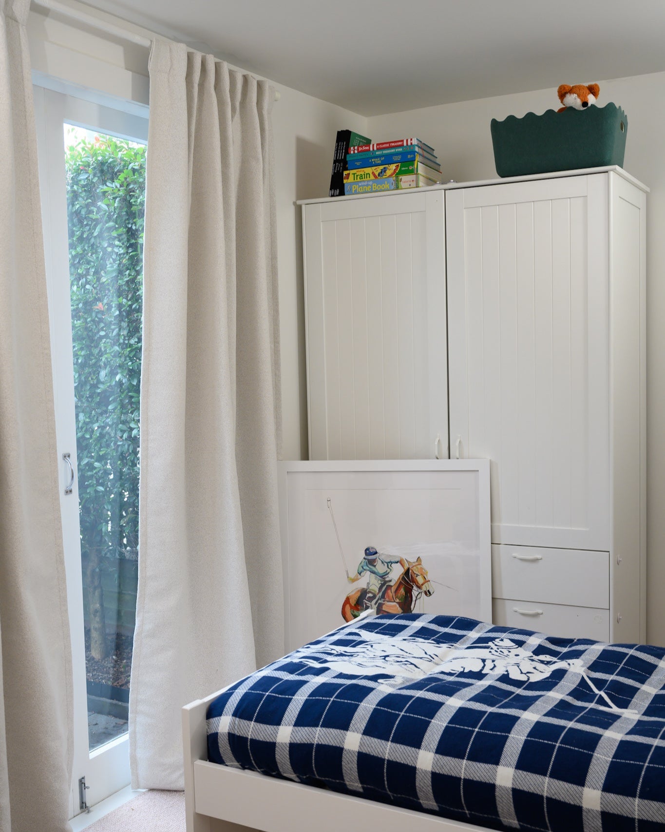 Brooklyn Boucle Curtain styled in a boy’s bedroom, a timeless design that grows with your child.