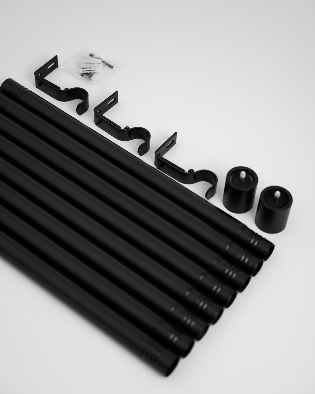 Unpacking the Rockford Rod in Black, with modular pieces that screw together for easy installation and compact, fast delivery.