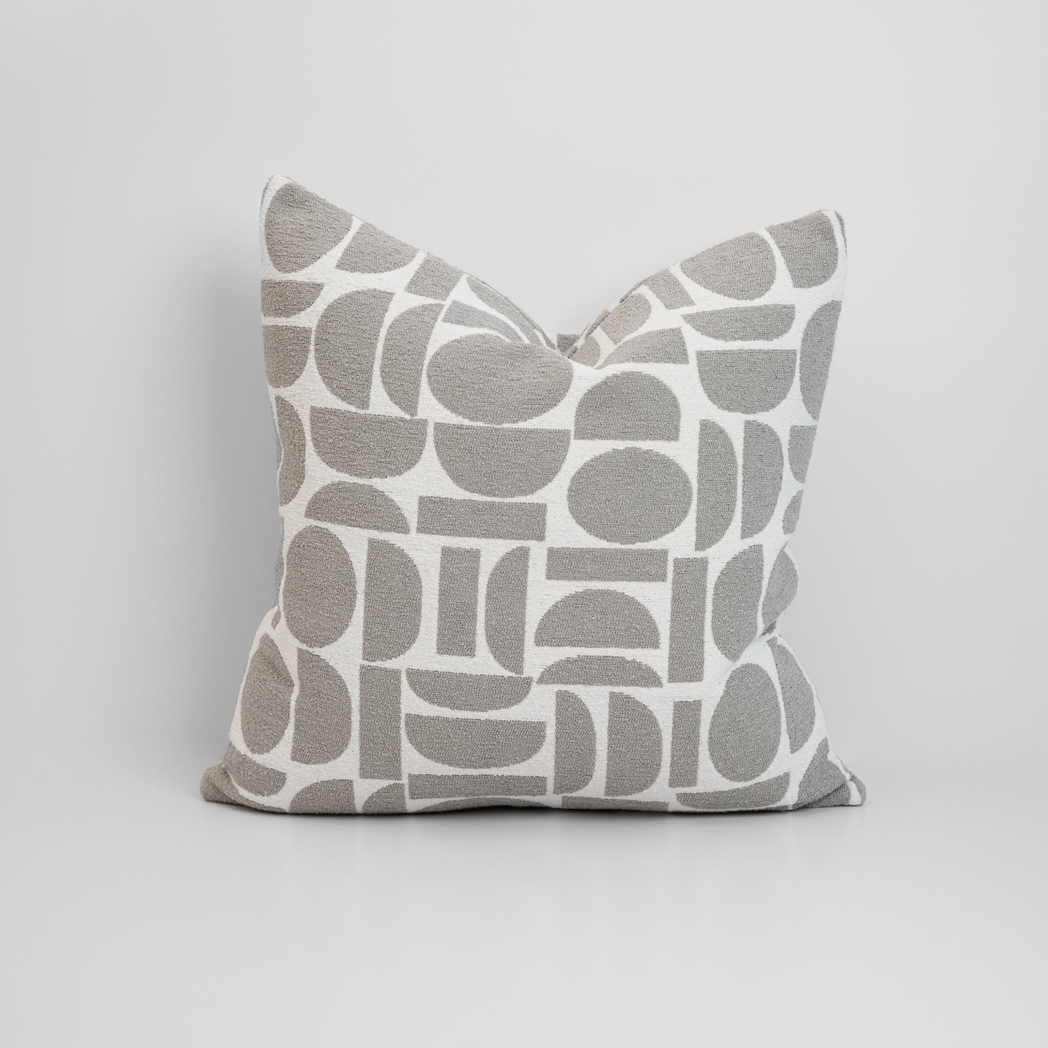 Chelsea Crescent Cushion in Dove Grey with boucle texture and geometric design, styled for a chic, modern finish.