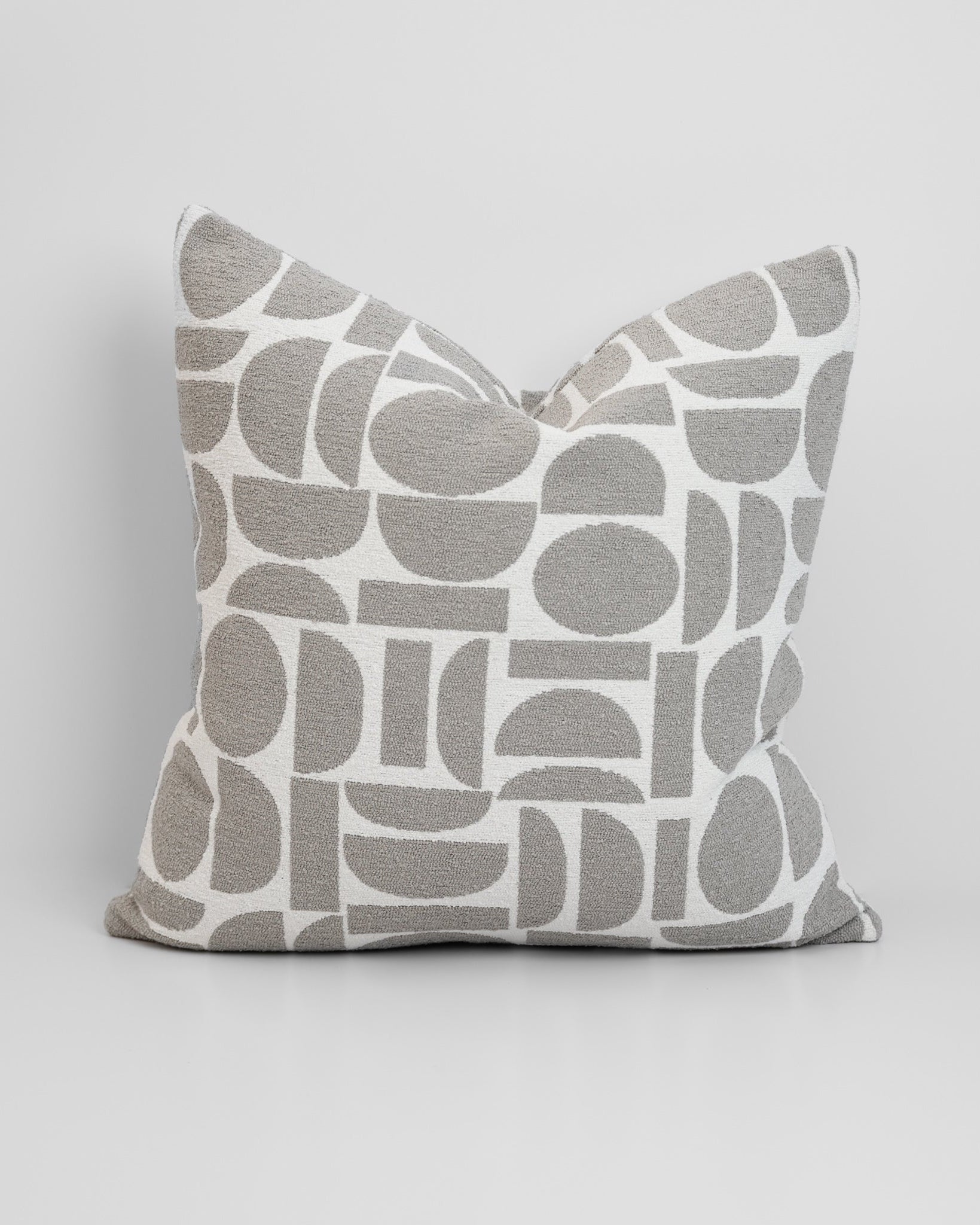 Chelsea Crescent Cushion in Dove Grey with boucle texture and geometric design, styled for a chic, modern finish.