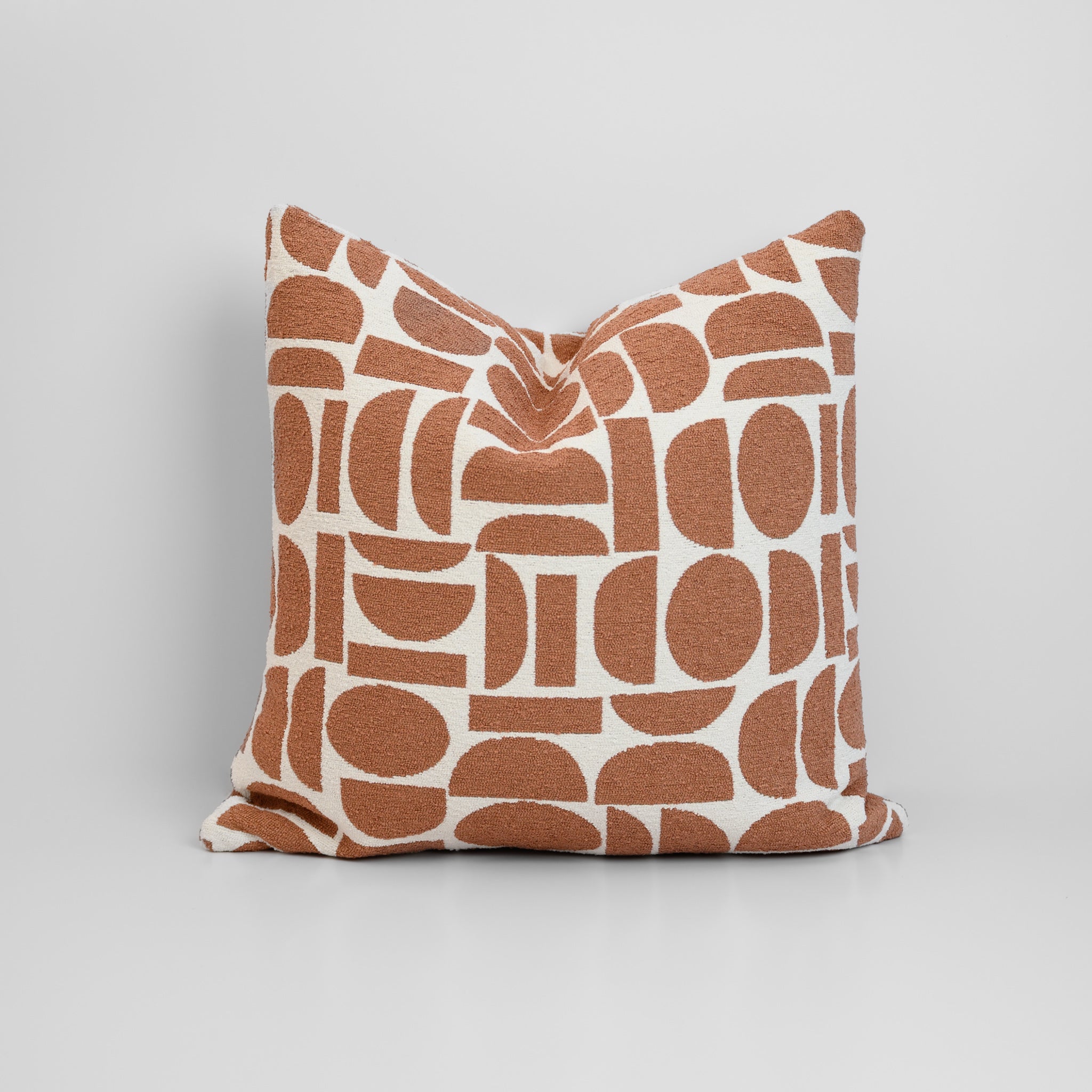 Chelsea Crescent Cushion in Terracotta with boucle texture and geometric design, styled for a chic, modern finish.