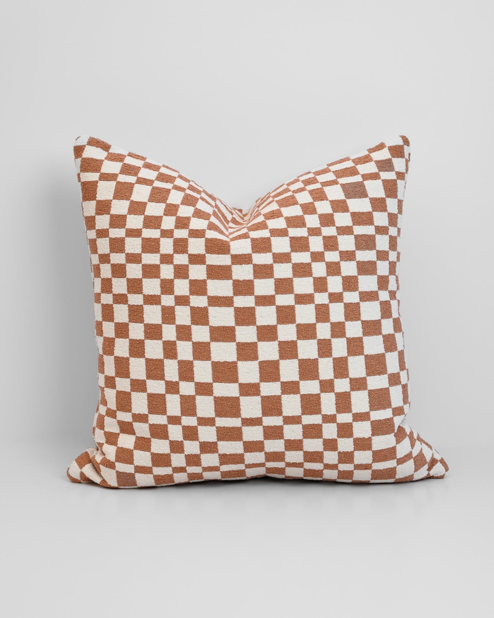 Chicago Check Cushion in Terracotta with boucle texture and tonal check pattern, styled for a chic, modern finish.
