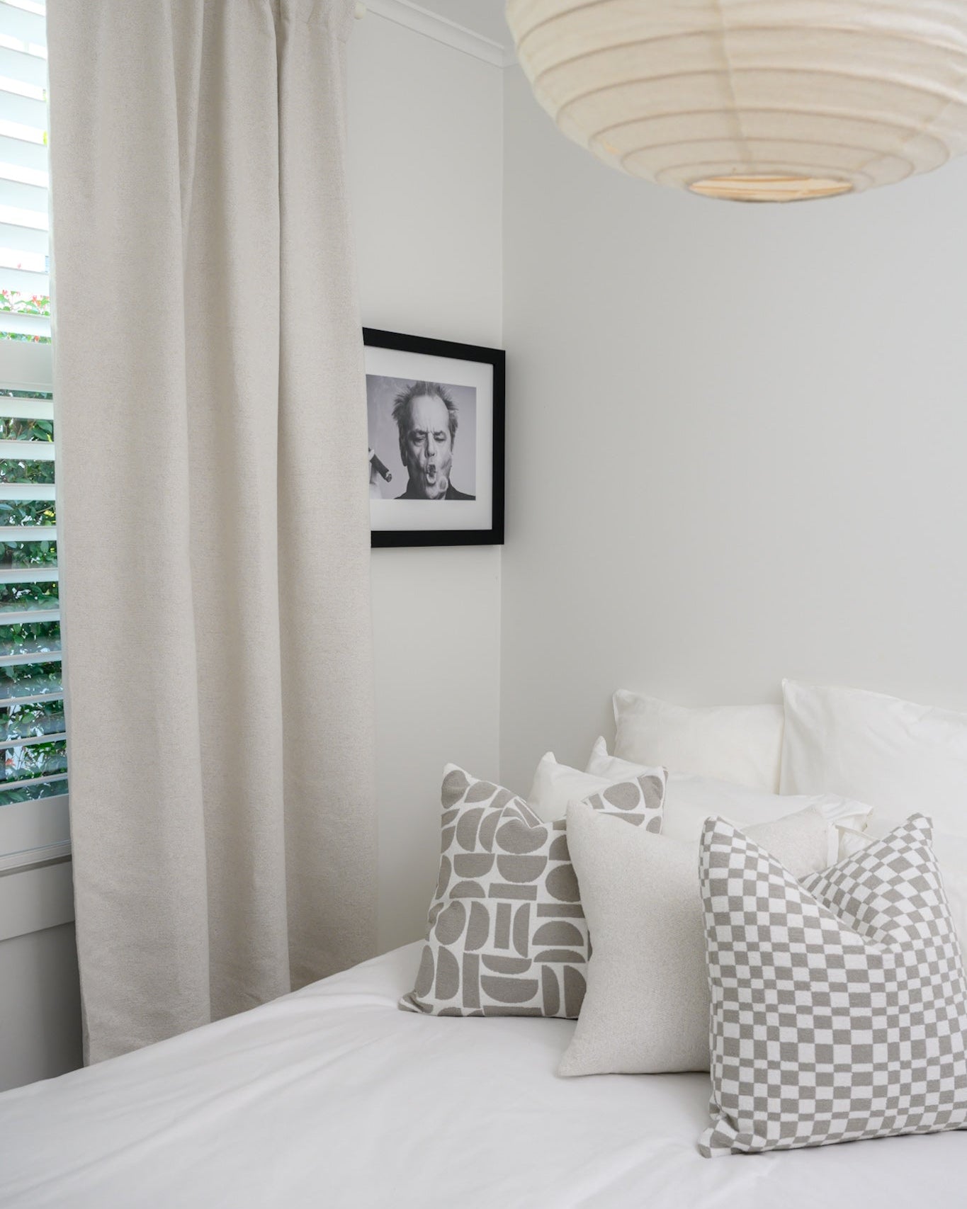 The Chicago Check Cushion styled in a bedroom with the Brooklyn Boucle and Chelsea Crescent Cushion