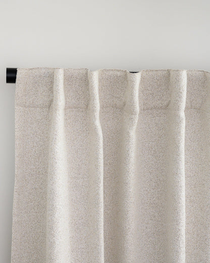 Brooklyn Boucle curtain with back tab header, styled in a relaxed pleat for a soft, designer finish.