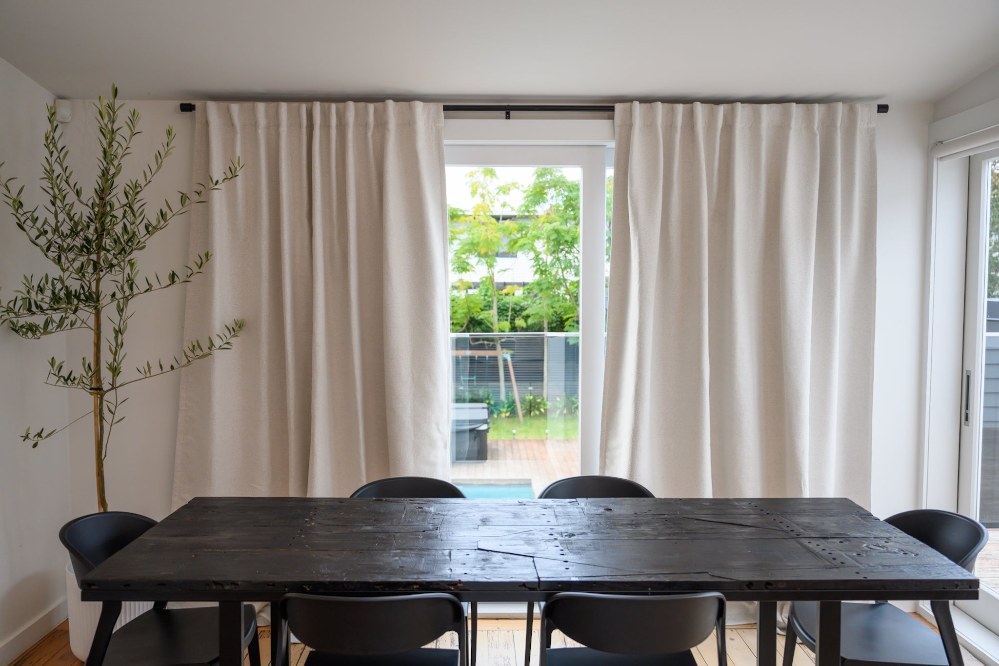 Before and after room makeover with Brooklyn Boucle curtains, instantly transforming the space with a quick, easy update.