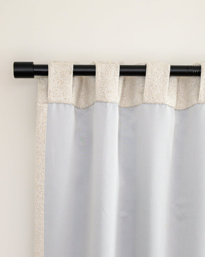 Back view of Brooklyn Boucle curtain with back tab heading, showing the clean finish and fabric-only room darkening lining.