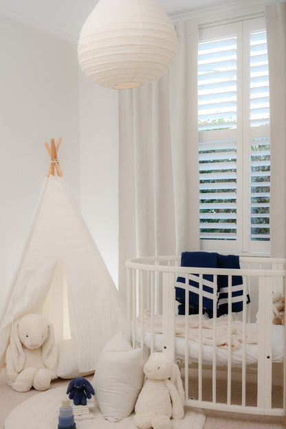 Baby boy’s nursery featuring Brooklyn Boucle curtains on the Rockford Rod in Soft White, a beautiful combination for warmth, style, and room darkening