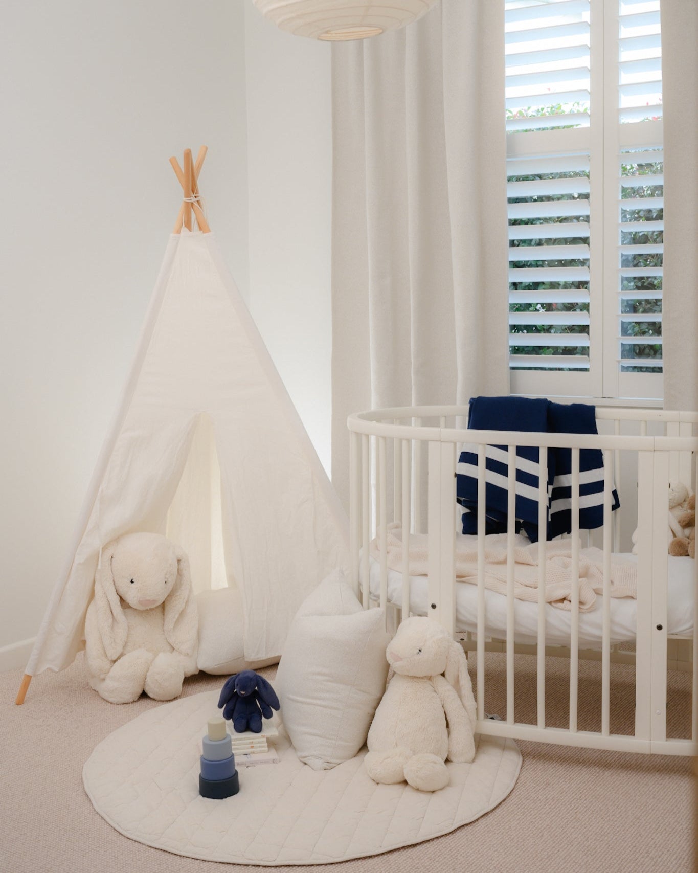 Brooklyn Boucle cushion styled in a beautiful baby boy’s nursery with matching boucle curtains — adding texture, warmth, and a soft, cosy finish.