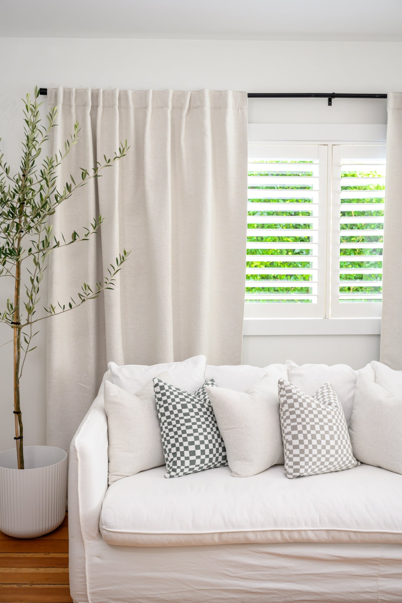 Brooklyn Boucle curtains styled on the Rockford Rod in black, a versatile pairing that works in every room and adds an instant modern designer touch.