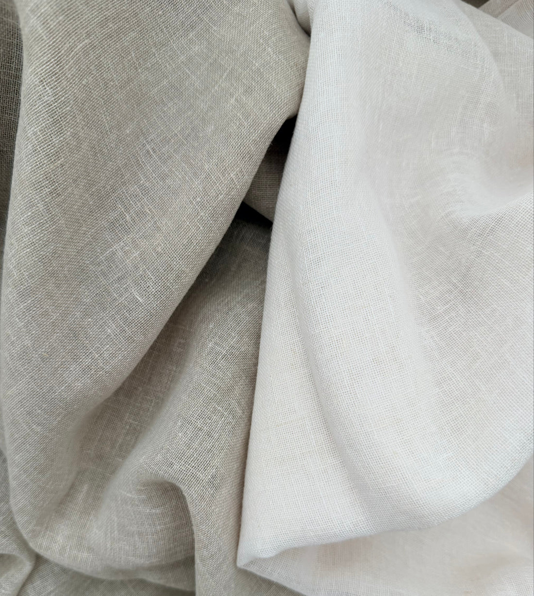 Soho Sheer curtain fabric in Soft White and Natural, showing the shades and linen blend texture.