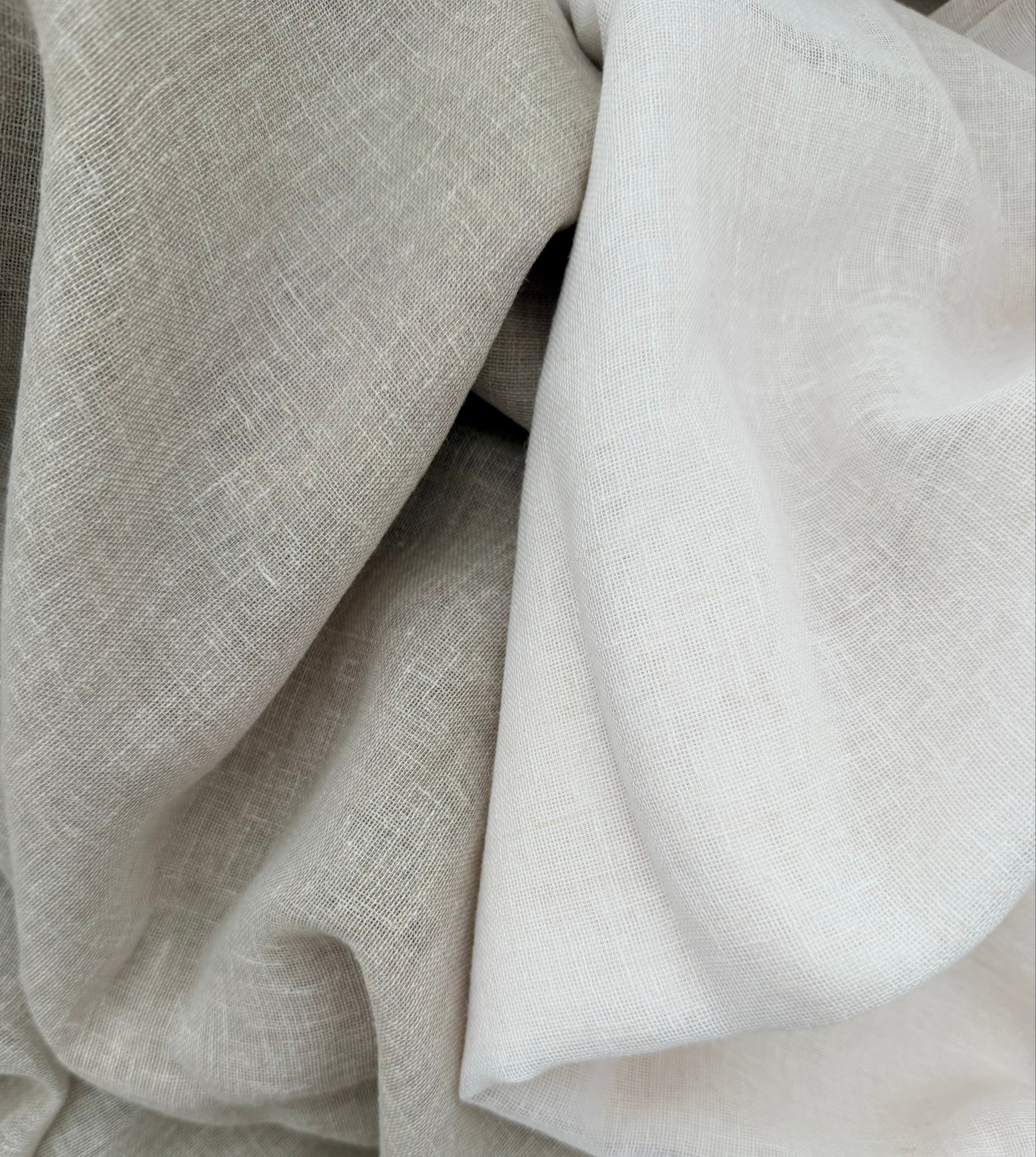 Soho Sheer curtain fabric in Soft White and Natural, showing the shades and linen blend texture.