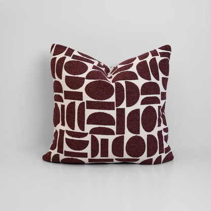 Chelsea Crescent Cushion in Burgundy with boucle texture and geometric design, styled for a chic, modern finish.