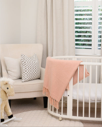 The Chicago Check Cushion Styled in Nursery, the perfect addition.