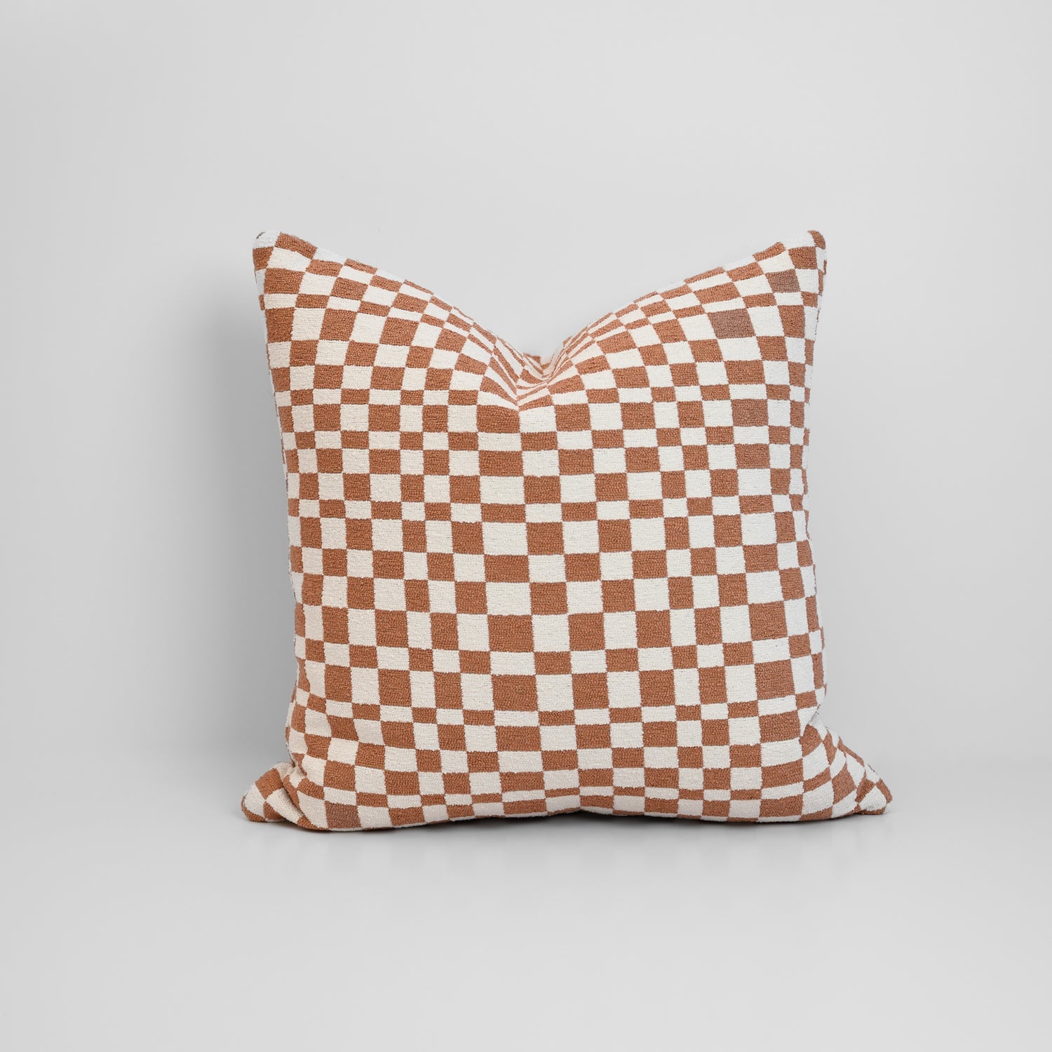 Chicago Check Cushion in Terracotta with boucle texture and tonal check pattern, styled for a chic, modern finish.