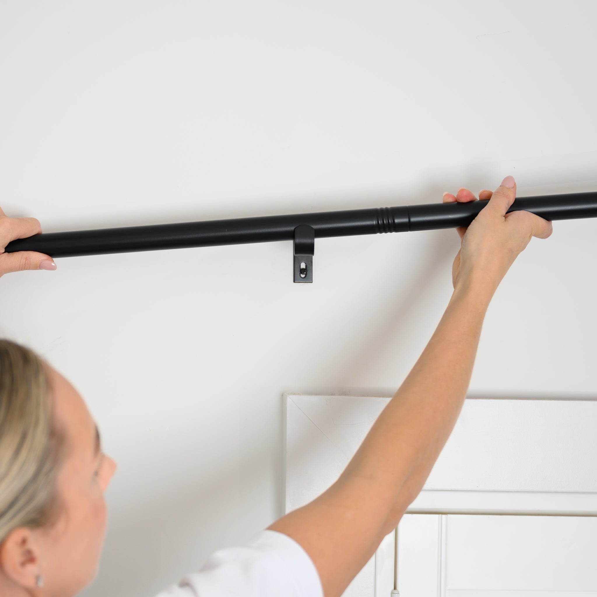 Rockford Rod in black being installed — quick, easy, and DIY-friendly.